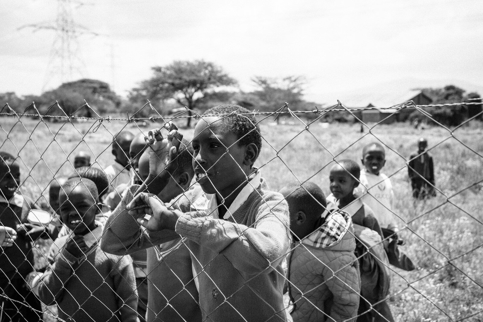 group of children inside fence